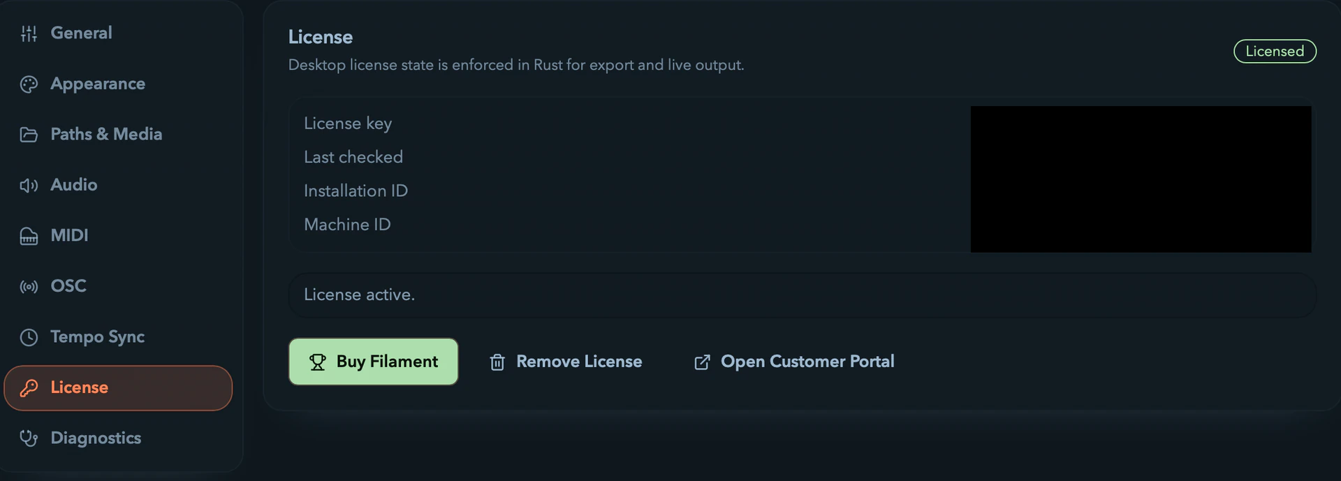 Filament's License settings card with state badge, identifiers, and action buttons.